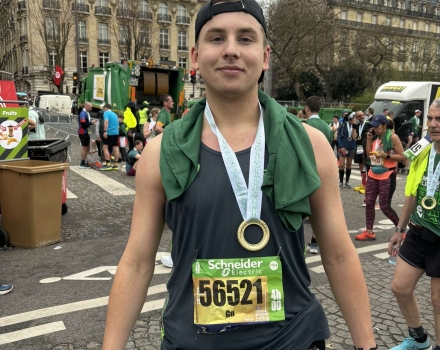 Guy with Paris Marathon Medal 