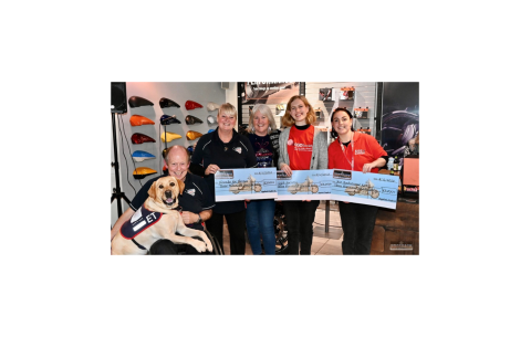 Cheque presentation with three different charities