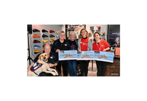 Cheque presentation with three different charities