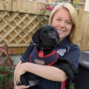 Dog trainer with puppy 