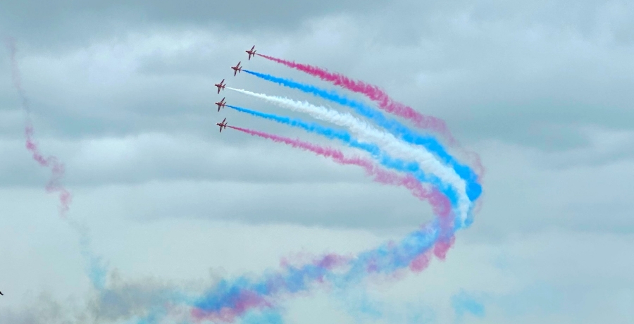 Red Arrows in formation with colours 