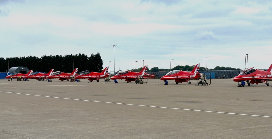 Red Arrows grounded in a row